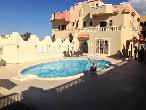 Amazing 4 bedrooms villa with a pool in Mubarak 6