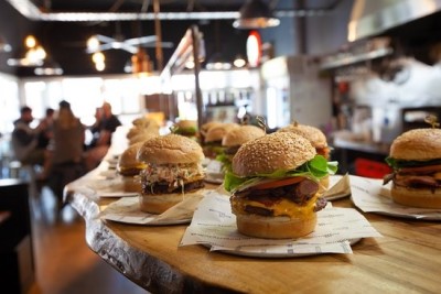 Why burger restaurants are popular in town?